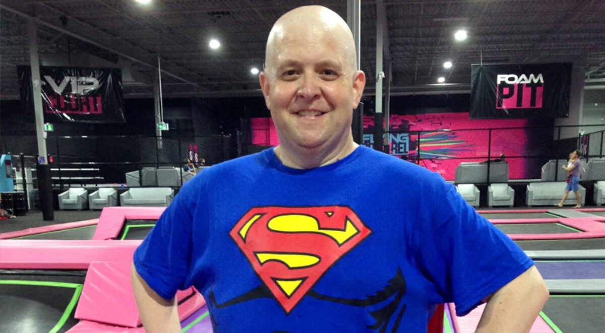 A photo of Steve Ewoniak in a Superman shirt